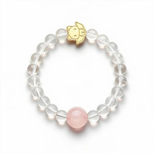 Orbii clear quartz crystal bead bracelet with a gold NFC charm and a single pink rose quartz accent bead.